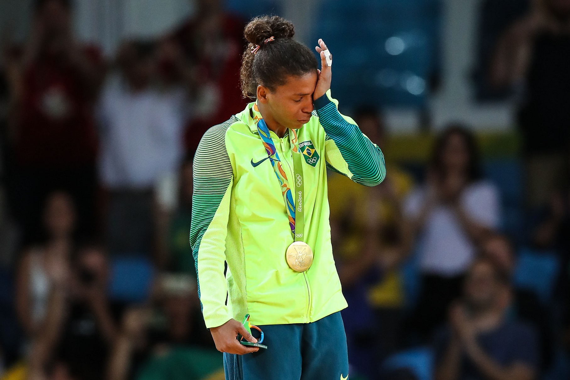 Rafaela Silva, medalha de ouro no judô, veio da Cidade de Deus, que tem um dos índices de progresso social mais baixos da cidade. Foto de Vanderlei Almeida/AFP