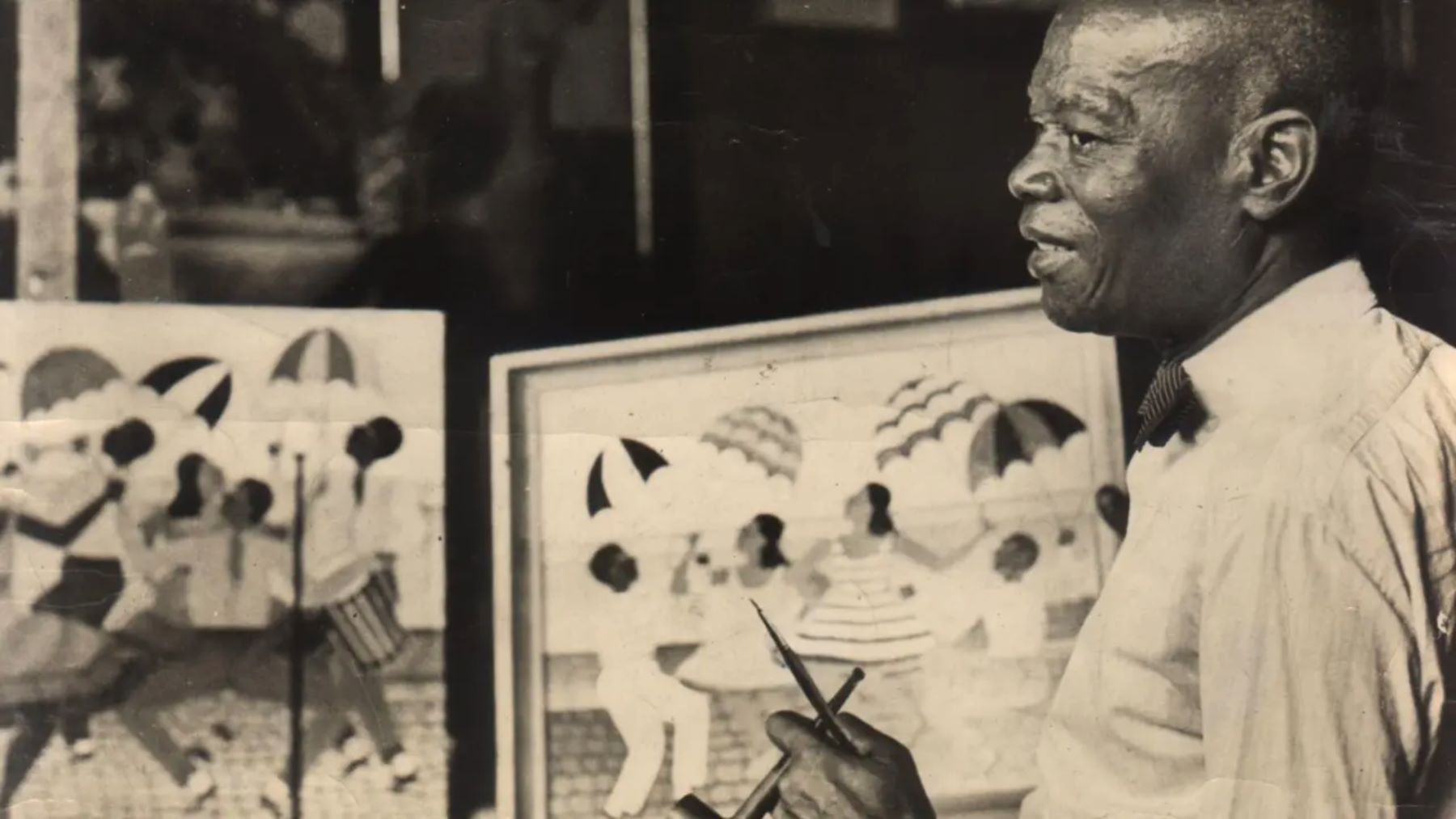 Heitor dos Prazeres em seu ateliê na região da Praça Onze, na Cidade Nova, na Pequena África: trajetória misturada a do Carnaval do Rio (Foto: Reprodução)